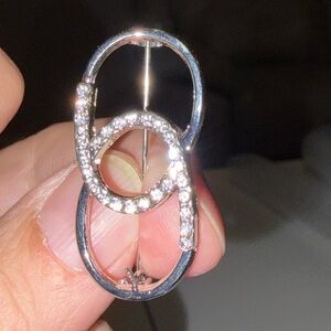 Elegant Silver and Crystal Loop Earrings.